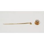 Gold-coloured metal tie stud with stickpin attachment set with old cut cushion-shaped rounded