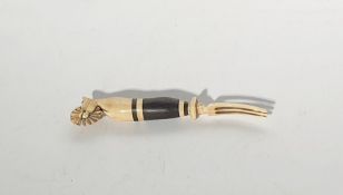 A carved ivory and stained hardwood prisoner of war pastry jigger/fork, decorated with a horse's