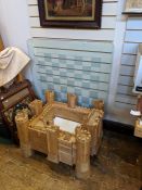 A 20th Century oak Heritage Tables jigsaw table with glass chessboard top, the whole in the form