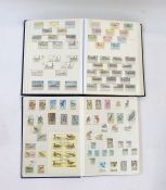 Three boxes comprising three stock books of thematic stamps of trains, boats, flowers, birds, etc, a