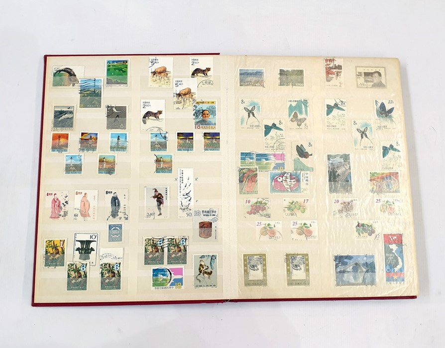 Stock book with large collection of stamps from China