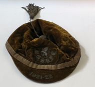 1921 green velvet M.G.S.R.F.C. rugby cap with Lion rampant and having metal thread button and tassel