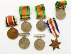 18 WWII medals with two boxes of issue. Copy Air Crew Europe Star. Two Police medals ( 1 bag)