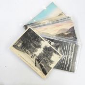 One case of postcards to include various subjects, including seaside, boyscouts, portraits and group