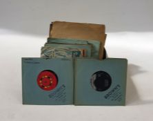 A collection of vintage vinyl records, including seven inch and ten inch