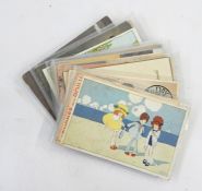 Two boxes of assorted postcards including Christmas, animals, and children, etc