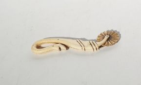 Carved ivory prisoner of war pastry jigger with curved serpent handle, bead eyes, 16cm long