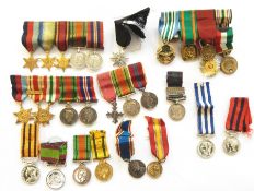 Framed miniature Military Cross group with a quantity of miniature medals