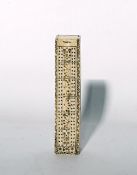 Carved prisoner of war bone dominoes box, rectangular with geometric decoration containing