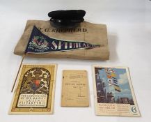 World War II naval badges and buttons, Union flag, kit bag,  WWII naval cap and newspapers, and