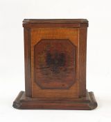 A wooden marquetry octagonal section box and cover, inlaid with an imperial eagle, dated 1917, the
