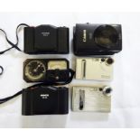 Two Mamiya lenses (one with case), a Minox 35 GL camera, a Kneb 35A camera, a Weston model 650