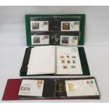 13 albums including two new age printed albums with some stamps, album with George VI coronation