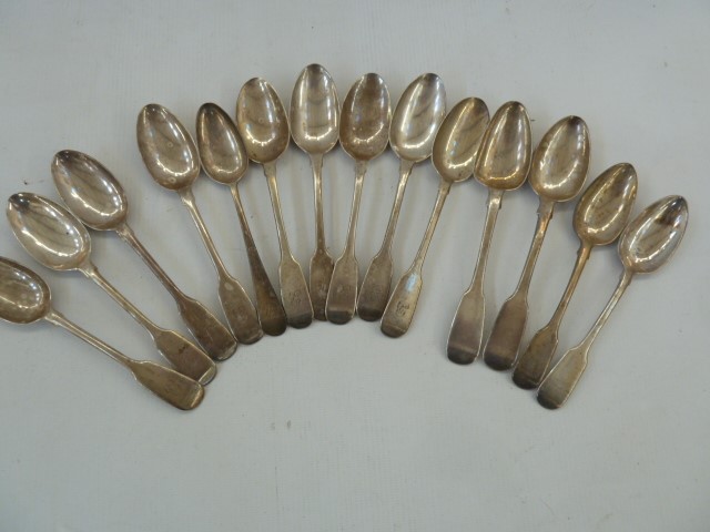 Assorted Georgian and Victorian silver fiddle pattern teaspoons, assorted dates and makers, 8.8ozt