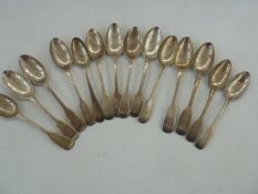 Assorted Georgian and Victorian silver fiddle pattern teaspoons, assorted dates and makers, 8.8ozt