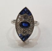 Victorian style platinum, sapphire and diamond ring, marquise-shaped, having central oval sapphire