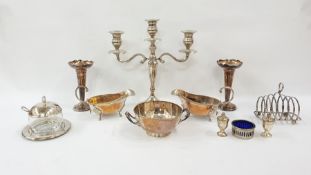 Pair of silver-plated gravy boats, a pair of silver-plated posy vases, a two-branch candelabra, a