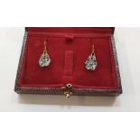 Pair of yellow gold-coloured metal, topaz and diamond earrings, each flowerhead set with five