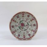 Chinese porcelain shallow dish, circular and decorated in famille rose colours, 19.5cm diameter