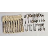 Assorted silver flatware to include teaspoons, sugar nips, silver-handled knives, etc, approx 10ozt