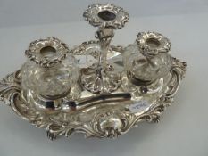 Victorian silver inkstand, with central candle holder, the central taper stick flanked by a pair