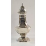 George V silver sugar caster of octagonal baluster form, stepped foot and domed octagonal pierced