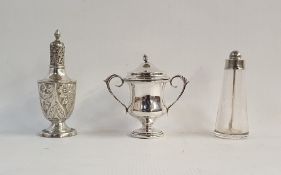 Edwardian silver pepperette, Birmingham 1904, a small silver-covered trophy cup, a glass phial