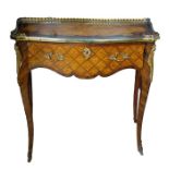 19th century French side table, Louis XVI style, the shaped top with three-quarter brass pierced