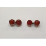 Pair amber-coloured hardstone and silver cufflinks, each double beehive pattern