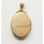 15ct gold locket, oval, with scroll loop  Condition ReportWeight 6g
