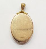 15ct gold locket, oval, with scroll loop  Condition ReportWeight 6g