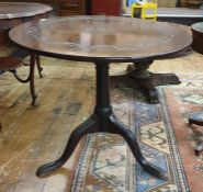 19th century mahogany circular centre table, the circular top with carved decoration, on birdcage