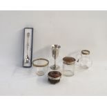 Silver and tortoiseshell brush and capped dressing table bottle, a silver presentation cup of bell