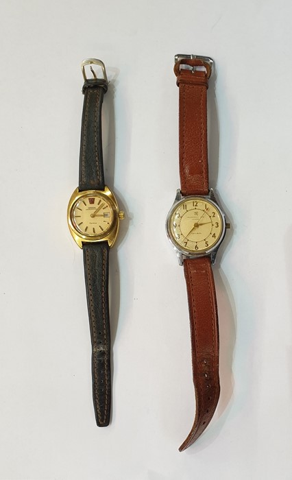 Lady's Omega Megaquartz gilt metal watch with calendar aperture and a mid 20th century gent's