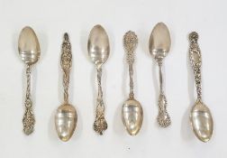 Six various ornate sterling white metal spoons, some with Art Nouveau decoration, possibly
