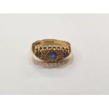 18ct gold, sapphire and diamond dress ring, the elliptical setting with three sapphires and four