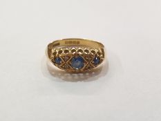 18ct gold, sapphire and diamond dress ring, the elliptical setting with three sapphires and four