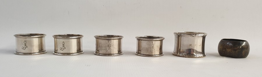 Six assorted silver napkin rings, 2.7ozt