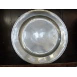 Two pewter platters, one with a London touchmark and also stamped BJM, 38cm diameter (2)
