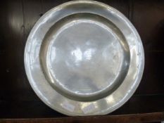 Two pewter platters, one with a London touchmark and also stamped BJM, 38cm diameter (2)