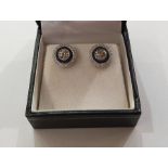 Pair of 18ct white gold, old-cut diamond and sapphire stud earrings, target-pattern, the centre
