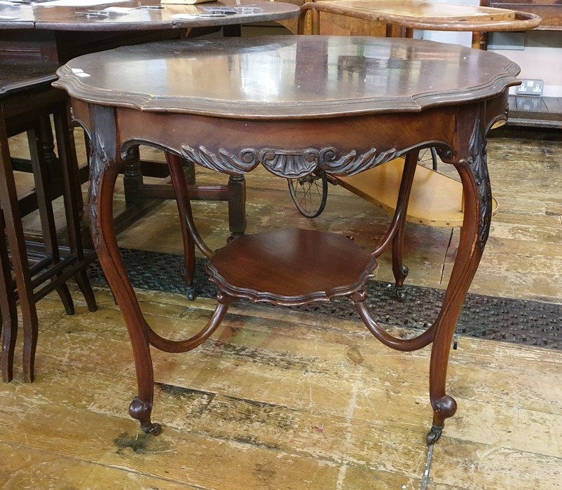 Victorian mahogany centre table, the circular and crimped top with moulded edge, the whole raised on