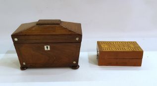 Sarcophagus-shaped tea caddy raised on bun feet with mother-of-pearl inlaid decoration, 20cm wide