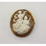 Gold-coloured metal and shell cameo brooch carved with allegorical maidens, one playing lute, scroll