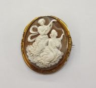 Gold-coloured metal and shell cameo brooch carved with allegorical maidens, one playing lute, scroll