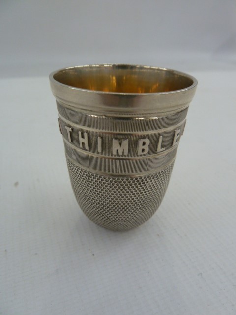 Victorian silver-coloured metal thimble whisky tot inscribed 'Just a Thimble Full', 800 mark