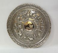 Indian/Burmese silver circular salver embossed with human figures and animals and a pierced floral