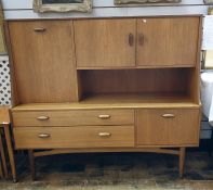 20th century teak lounge unit in the manner of G-Plan, with assorted cupboard doors and drawers,