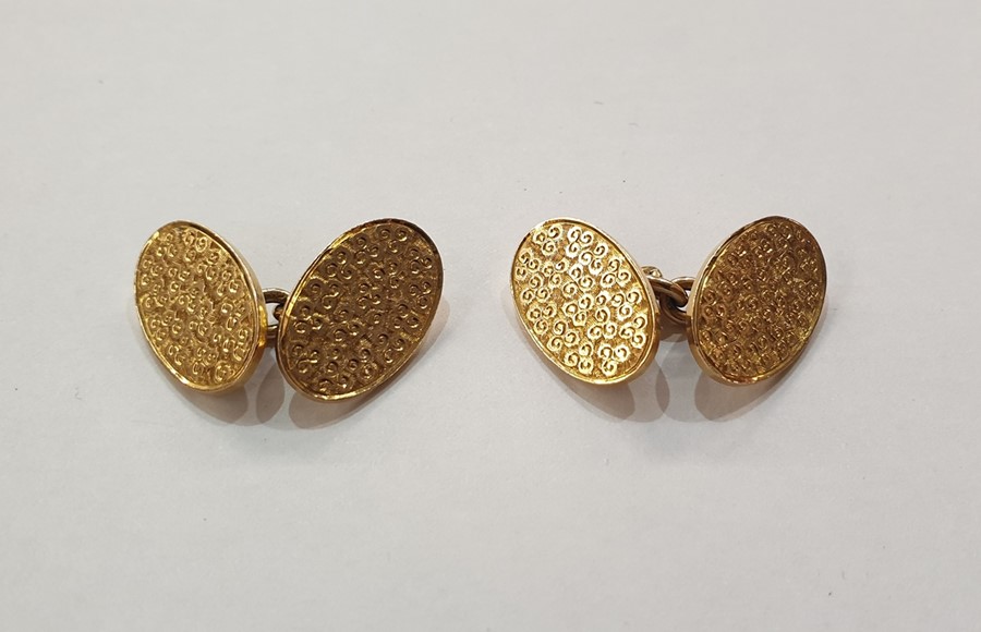 Pair of 15ct gold double oval and chain cufflinks, whirl engraved, approx. 11g gross