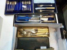 Pair silver handled cake servers, 11 plated coffee spoons and nips, cased and other plated flatware